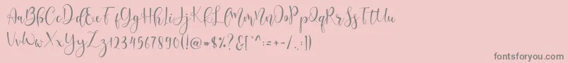 フォントdelisha – ピンクの背景に灰色の文字