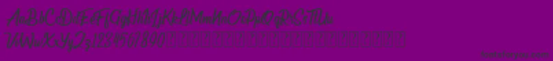 Шрифт Deliverance FREE FOR PERSONAL USE – чёрные шрифты на фиолетовом фоне