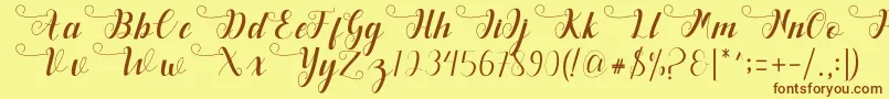 Deliya Font – Brown Fonts on Yellow Background