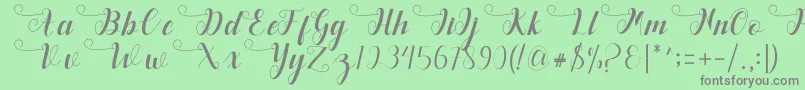 Deliya Font – Gray Fonts on Green Background