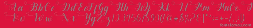 Deliya Font – Gray Fonts on Red Background