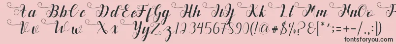 Deliya Font – Black Fonts on Pink Background