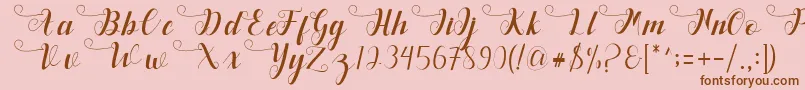 Deliya-Schriftart – Braune Schriften auf rosa Hintergrund