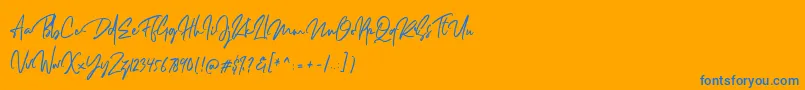 Dellamonde-Schriftart – Blaue Schriften auf orangefarbenem Hintergrund