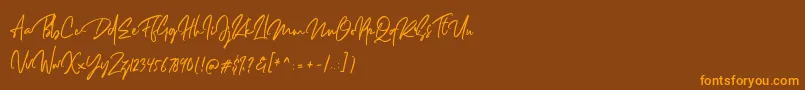 Шрифт Dellamonde – оранжевые шрифты на коричневом фоне