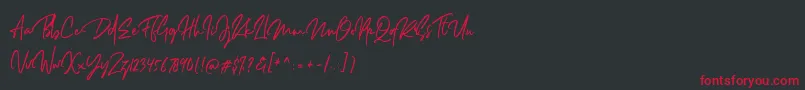 Dellamonde Font – Red Fonts on Black Background