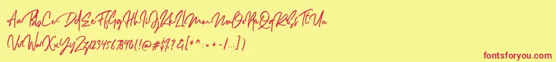 Dellamonde-Schriftart – Rote Schriften auf gelbem Hintergrund