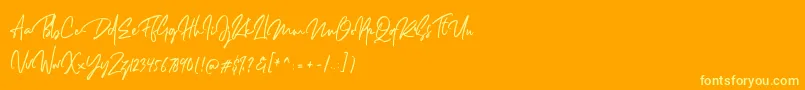 Dellamonde Font – Yellow Fonts on Orange Background