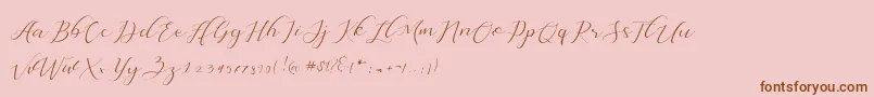 Dellisya-Schriftart – Braune Schriften auf rosa Hintergrund