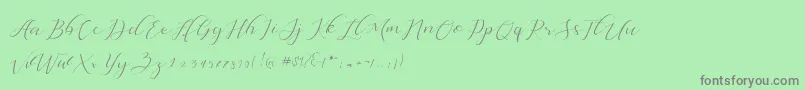 Dellisya-Schriftart – Graue Schriften auf grünem Hintergrund