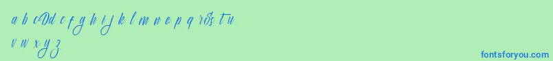Delphin Spring Font – Blue Fonts on Green Background