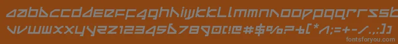 deltaraysemital-fontti – harmaat kirjasimet ruskealla taustalla