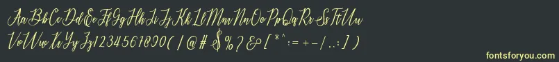 フォントdelthami – 黒い背景に黄色の文字