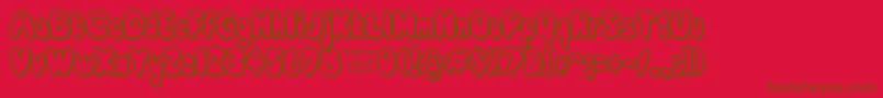 Fonte ComicWhiteRabbitDemo – fontes marrons em um fundo vermelho