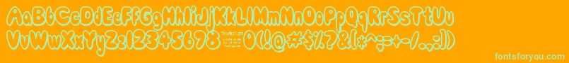 ComicWhiteRabbitDemo Font – Green Fonts on Orange Background