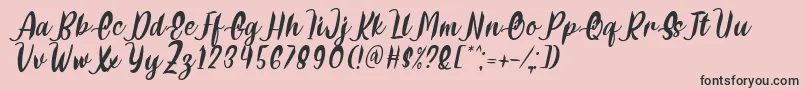 Delumba Italic Font by 7NTypes-fontti – mustat fontit vaaleanpunaisella taustalla