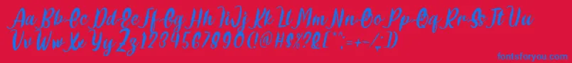 フォントDelumba Italic Font by 7NTypes – 赤い背景に青い文字