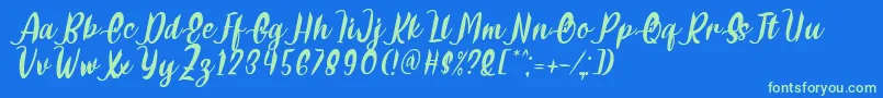 フォントDelumba Italic Font by 7NTypes – 青い背景に緑のフォント