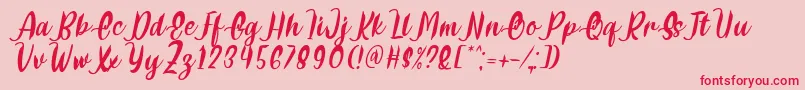 Delumba Italic Font by 7NTypes Font – Red Fonts on Pink Background