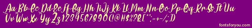 Delumba Italic Font by 7NTypes Font – Yellow Fonts on Purple Background