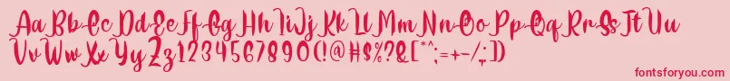 Шрифт Delumba Regular Font by 7NTypes – красные шрифты на розовом фоне