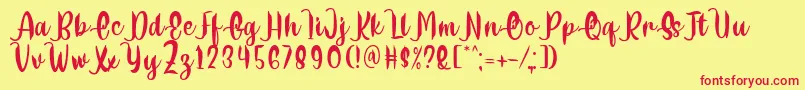 Шрифт Delumba Regular Font by 7NTypes – красные шрифты на жёлтом фоне