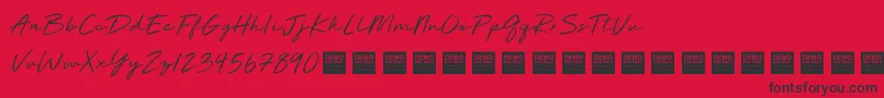 Deluxe Edition   Demo Font – Black Fonts on Red Background