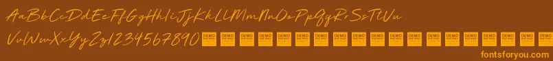 Deluxe Edition   Demo-Schriftart – Orangefarbene Schriften auf braunem Hintergrund
