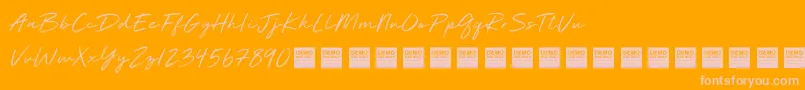 Deluxe Edition   Demo Font – Pink Fonts on Orange Background