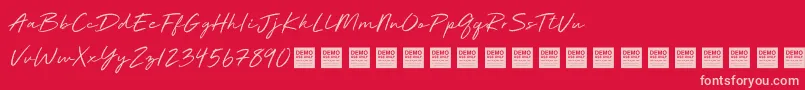 フォントDeluxe Edition   Demo – 赤い背景にピンクのフォント