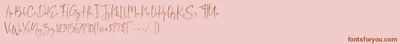 Demo Balnes-Schriftart – Braune Schriften auf rosa Hintergrund