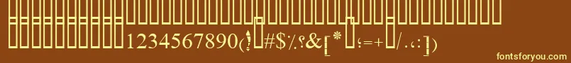 PtSimpleBoldRuled-fontti – keltaiset fontit ruskealla taustalla