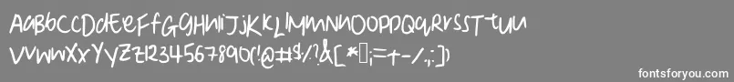 フォントDenise  s Manuscript – 灰色の背景に白い文字