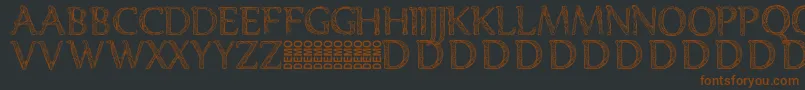 Denka Demo-Schriftart – Braune Schriften auf schwarzem Hintergrund