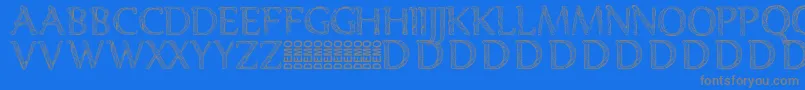 フォントDenka Demo – 青い背景に灰色の文字