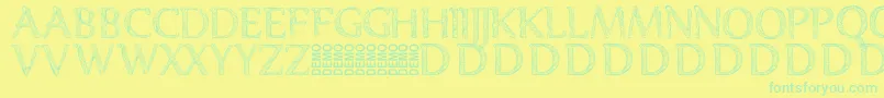 Denka Demo-Schriftart – Grüne Schriften auf gelbem Hintergrund
