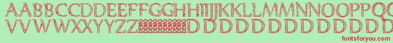 Denka Demo-fontti – punaiset fontit vihreällä taustalla