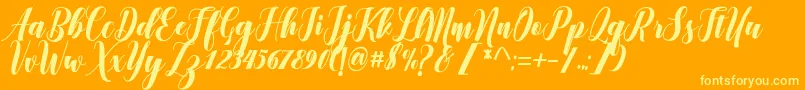 Denmahis Font – Yellow Fonts on Orange Background