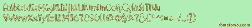 Denne Shuffle-fontti – ruskeat fontit vihreällä taustalla