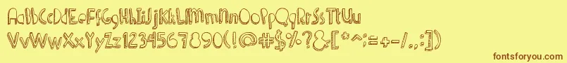 fuente Denne Shuffle – Fuentes Marrones Sobre Fondo Amarillo