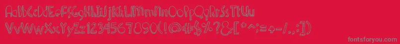 fuente Denne Shuffle – Fuentes Grises Sobre Fondo Rojo