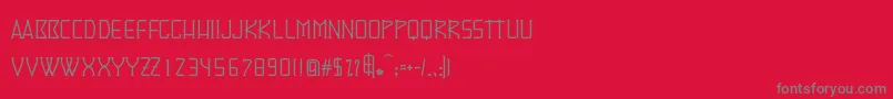 フォントDenominator – 赤い背景に灰色の文字