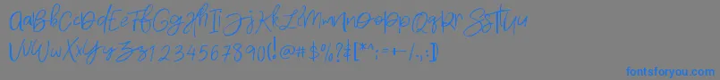 フォントDensfort – 灰色の背景に青い文字