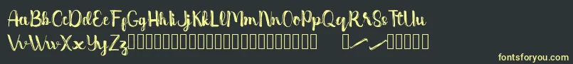 Dentanx Font – Yellow Fonts on Black Background
