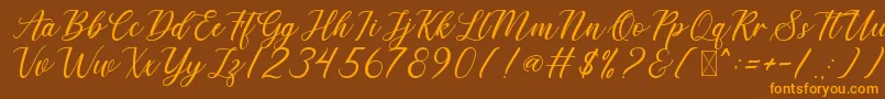 DerickChetty Font – Orange Fonts on Brown Background