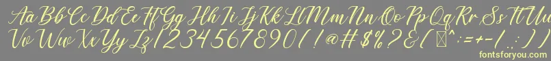 DerickChetty Font – Yellow Fonts on Gray Background