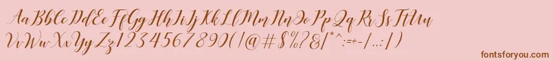 Desyanti Font – Brown Fonts on Pink Background