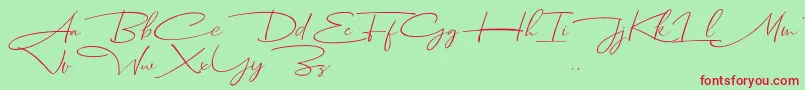 Dhanikans Signature Italic dafont-Schriftart – Rote Schriften auf grünem Hintergrund