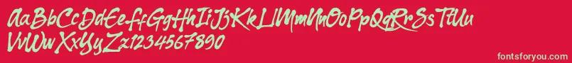 Dharko Gilbert Font – Green Fonts on Red Background