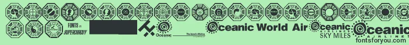 Czcionka Dharma Initiative Logos – czarne czcionki na zielonym tle